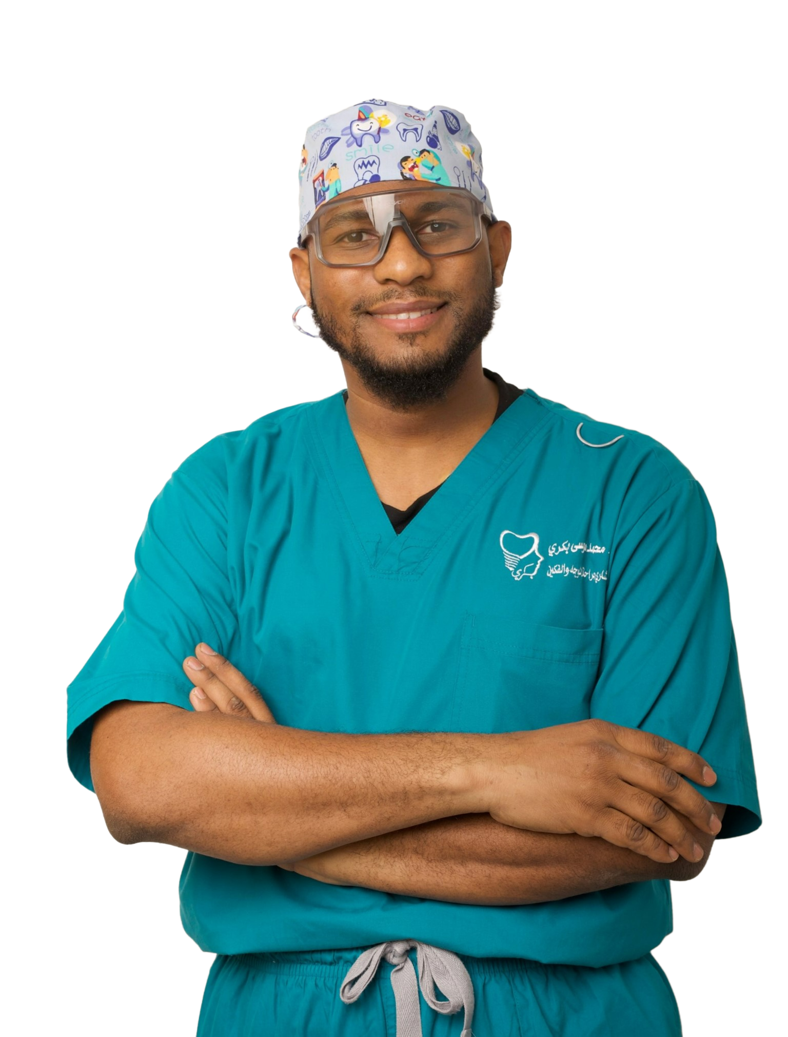 Dr. Bakri in teal scrubs and protective glasses on a white background